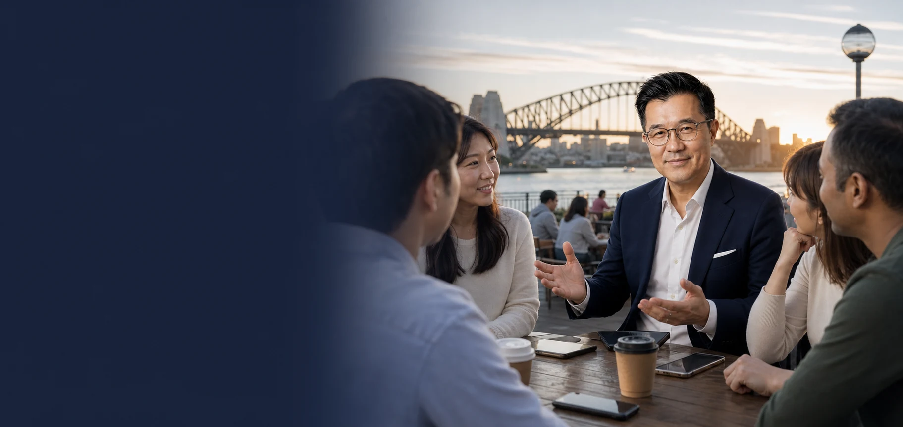 T.A.L.K. Lawyers community members talking beside Sydney Harbour